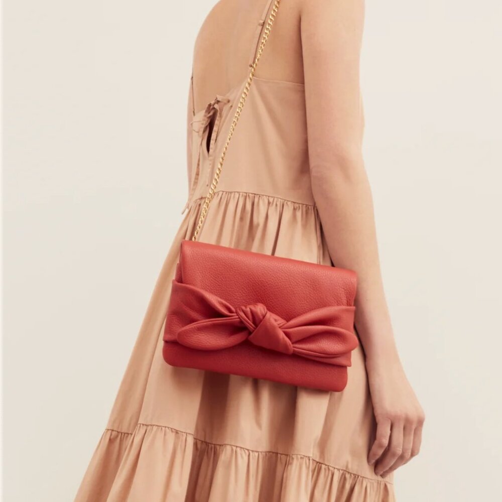 Cuyana Bow Clutch in Dark Coral